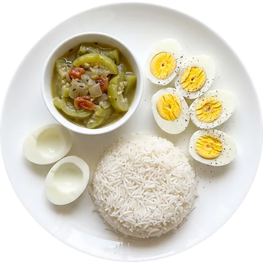 Boiled eggs with rice and tori sabzi on a white plate