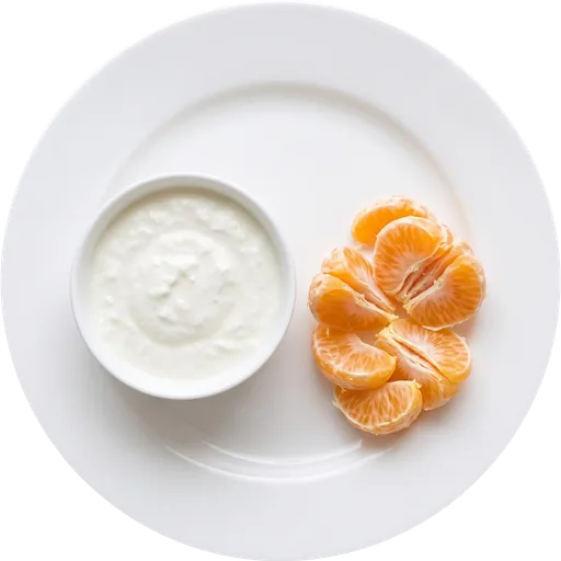 Curd with a fruit on a white plate