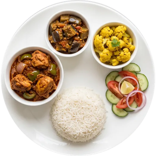 Kadhai chicken with rice and salad on a white plate