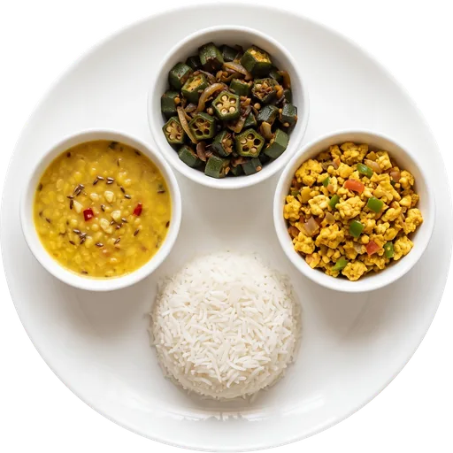 Paneer bhurji with bhindi, dal and rice on a white plate