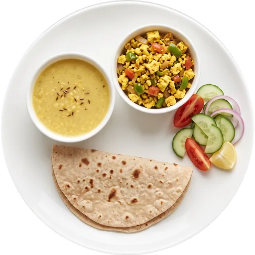 Paneer bhurji with dal, roti and salad on a white plate