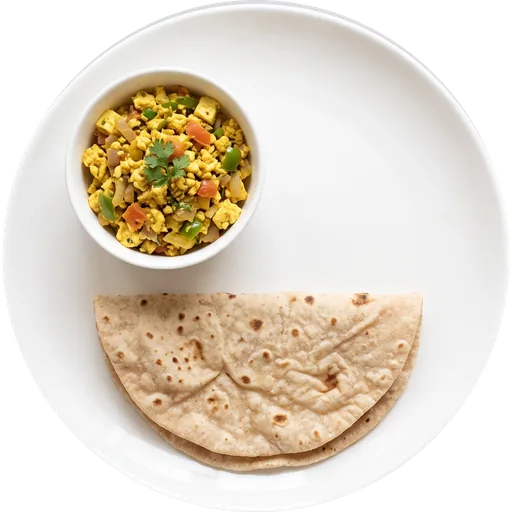 Paneer bhurji with roti on a white plate