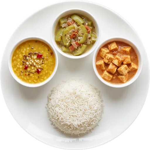 Rice, dal and tori sabzi with paneer on a white plate