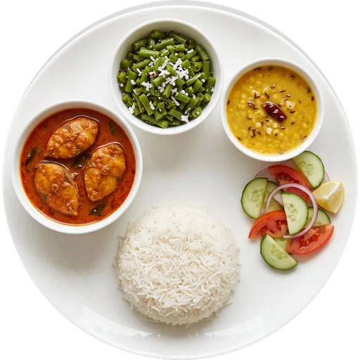Rice with fish curry, dal and salad on a white plate