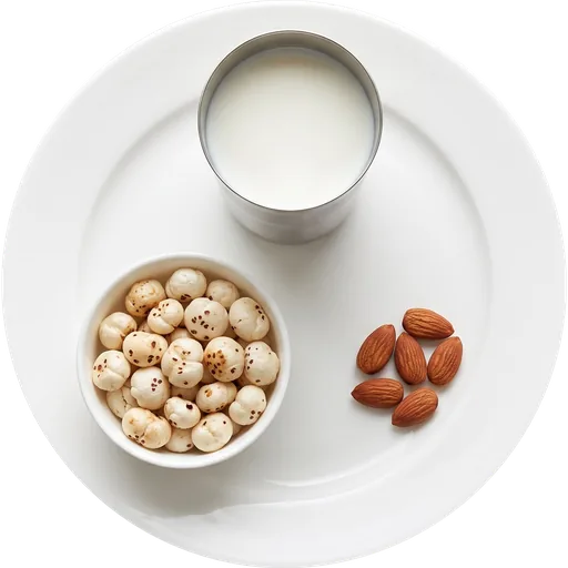 Roasted makhana with milk and almonds on a white plate