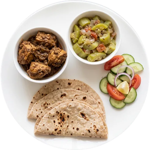 Roti with chicken bhuna and salad on a white plate