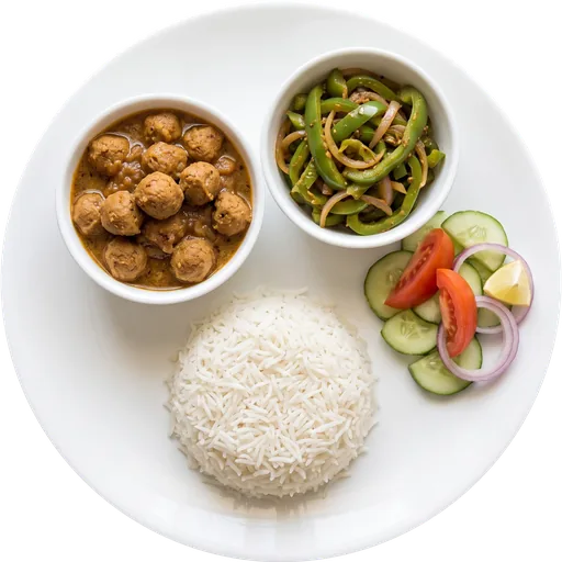 Soya chunk curry with rice on a white plate